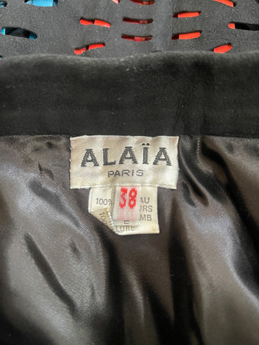 ARCHIVE - 1994 Alaia Black Suede Cut Out Skirt with Green Red and Blue Tassels